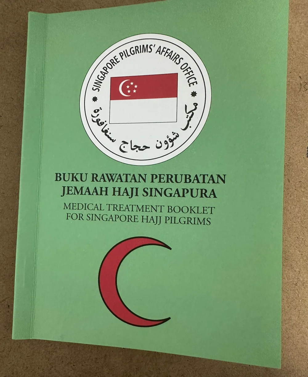 Green medical booklet for Singapore Hajj pilgrims issued by Singapore Pilgrims’ Affairs Office.